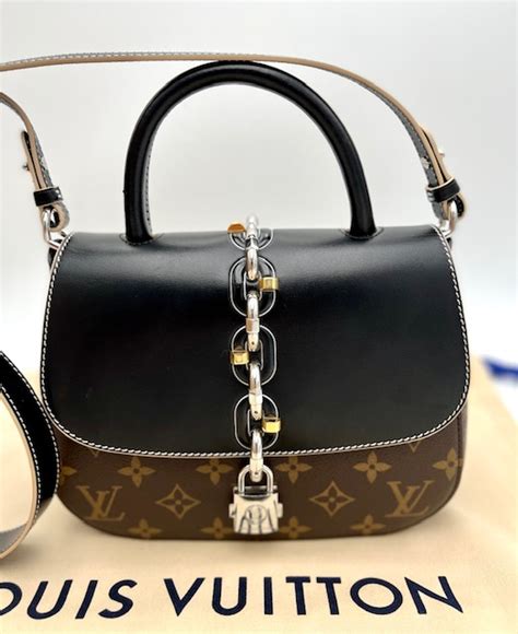 chain it louis vuitton pm|LOUIS VUITTON Calfskin Monogram Chain It Bag PM Black.